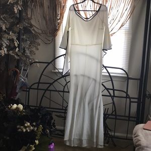 Off White dress black trim.